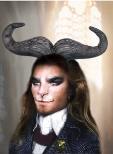 Detail of black foldable ox horn headband for Halloween cosplay party costumes