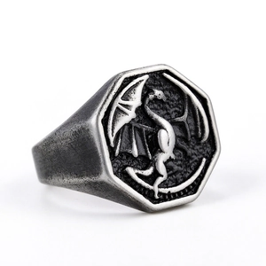 Vintage silver Viking dragon ring with embossed octagon face and retro oxidized finish