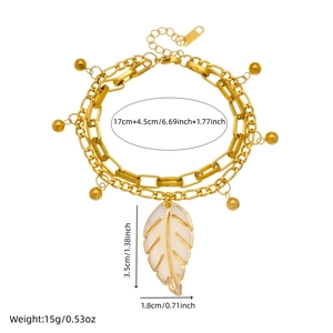 Double-layered gold stainless steel chain bracelet with white leaf pendant and gold beads