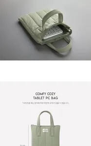 Sage green quilted laptop bag with zipper and handle showing detailed size measurements