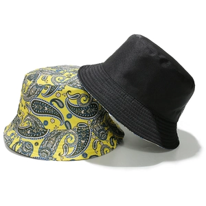 Vintage paisley print fisherman bucket hat set in black and yellow for stylish sun protection