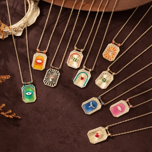 Vintage gold rectangular tarot necklaces with colorful enamel motifs and zircon pavé