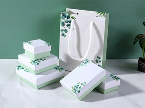 Green eucalyptus floral jewelry gift box set with matching paper shopping bag