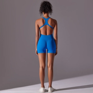 Detail of royal blue ribbed bodysuit with seamless racerback design for fitness yoga