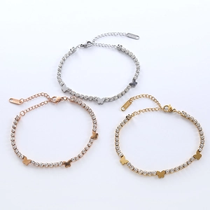 Elegant butterfly tennis bracelets in gold, silver, and rose gold finishes on white background