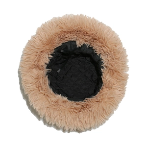 Detail of khaki plush bucket hat showing black quilted lining and soft fuzzy texture