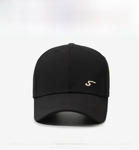 Detail of black baseball cap with embroidered Sport text and premium six-panel structure