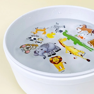 Detail of floating waterproof animal stickers with English words like Lion and Elephant