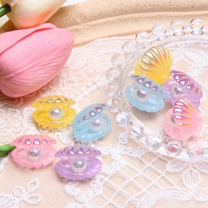 Colorful resin shell charms with faux pearls and iridescent finish for DIY crafts