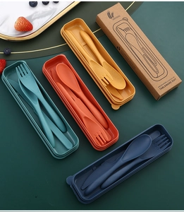 Macro shot of eco-friendly wheat straw cutlery sets with case in multiple colors