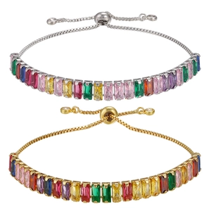 Close-up of adjustable rainbow zircon bracelets in gold and silver finishes