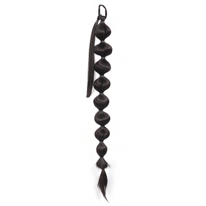 Detail of a 75cm long dark brown bubble ponytail extension with soft synthetic hair fiber