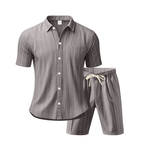 Detail of grey striped linen shirt and shorts set with textured fabric and M size tag