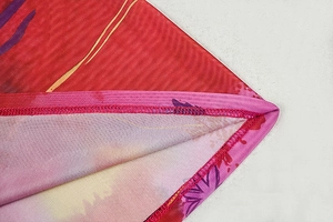 Detailed macro view of mesh fabric with abstract print and reinforced double stitching