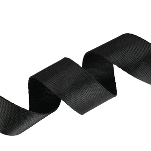Detail of high-density black woven strap featuring premium nylon texture and sleek wavy design