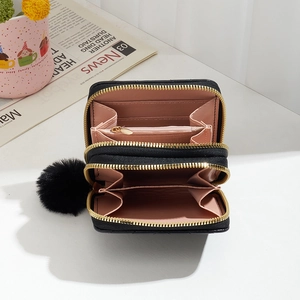 Black V-quilted double zipper wallet for women with pink lining and plush pendant