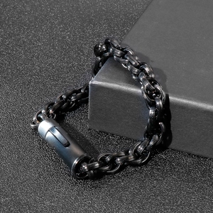 Detail of black punk style steel chain bracelet on premium gift box packaging