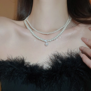 Double-layered pearl necklace with zircon pendant and elegant cream beads for women