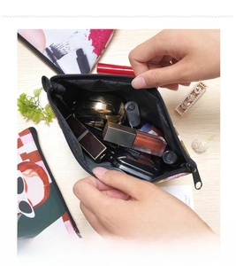 Detail view of sunflower dumpling makeup bag interior showing capacity for cosmetics