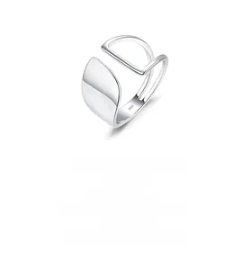 Macro detail of geometric S925 sterling silver ring showing minimalist polished surface