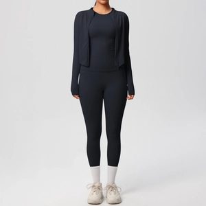 Detailed view of women's black three-piece sports set with zip jacket and high-waist yoga pants
