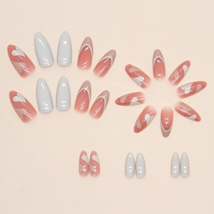 Sweet apricot almond fake nails with white hearts and French tips in 24pcs box set