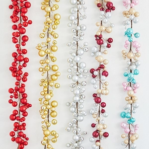 Five styles of Christmas berry ball garlands in red gold and silver for tree decoration