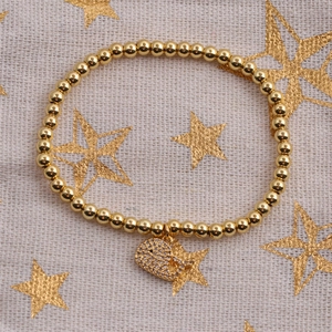 Bracelet élastique à perles dorées avec pendentif dauphin en zircon scintillant pour femme