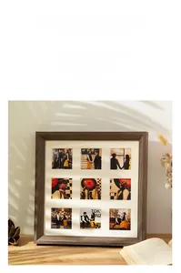 Detail of creative 9-grid wooden photo frame with hollow design for wall and tabletop display