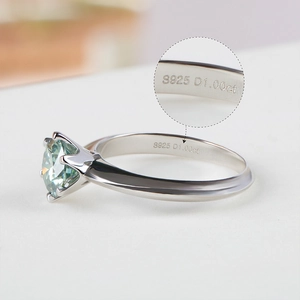 Detailed close-up showing S925 and D1.00ct hallmarks on the silver ring shank