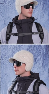 Dettagli in maglia e paraorecchie caldi di un cappello invernale beige in un paesaggio innevato