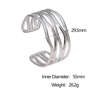 Detail view of silver multi-layer open bangle with dimensions 55mm inner diameter