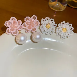 Elegant pearl flower cluster stud earrings with pink beads and gold accents for women