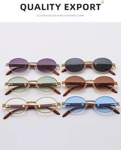 Various colors of oval vintage sunglasses with metal frames and wood grain temples