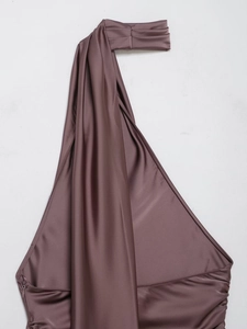 Detailed close-up of a mauve satin halter top featuring a smooth silk-like texture