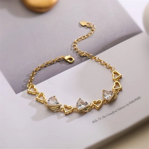 Detail of adjustable gold heart bracelet with micro-pave cubic zirconia and lobster clasp