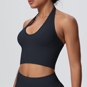 Close-up of black seamless ribbed sports halter neck bra with a cropped fit for fitness