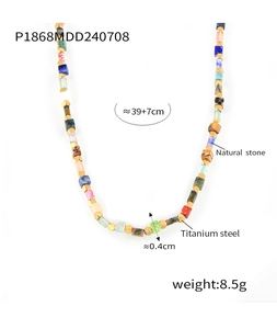 Macro view of bohemian necklace featuring multi-color natural stones and titanium steel beads