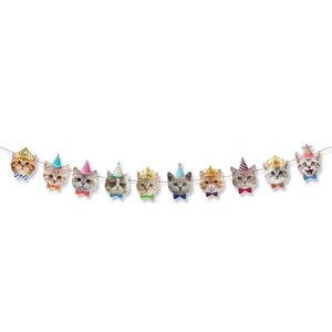 Detailed view of paper cat silhouettes with birthday hats for party banner decorations