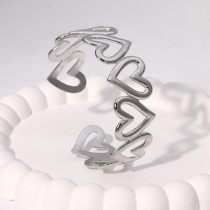 Minimalist silver heart shaped open stainless steel ring with hollow wave design pattern