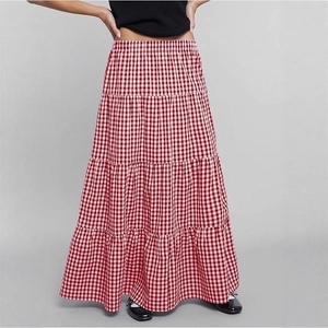 Close-up of red and white plaid fabric layers on high-waist tiered maxi skirt