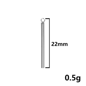 Macro shot of 22mm silver stainless steel cylinder pendant with 0.5g weight detail