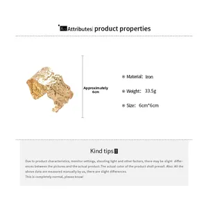 Detailed view of 6cm hammered gold iron cuff bracelet with textured irregular finish