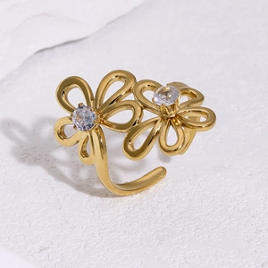 Detail shot of a gold-plated 18k floral open ring with sparkling zircon stone accents