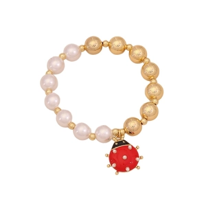 Fashion faux pearl beaded bracelet featuring a cute red ladybug charm and gold polished beads