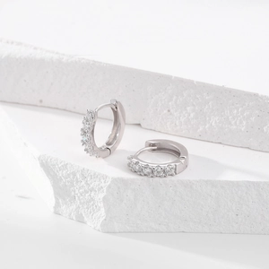 Elegant S925 sterling silver hoop earrings with micro-set cubic zirconia on stone base