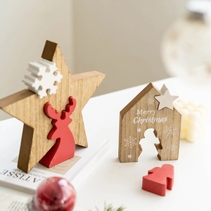 Wooden Christmas table decor set featuring star deer and house shapes with festive motifs
