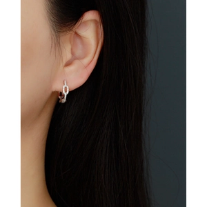 Detailed view of S925 sterling silver chain link earrings with pavé set crystals