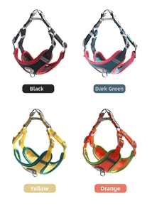 Detail view of colorful adjustable pet harnesses with reflective strips and buckles