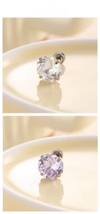 Macro shot of 8mm octagon cut white and lavender cubic zirconia stud earrings in 4-prong setting